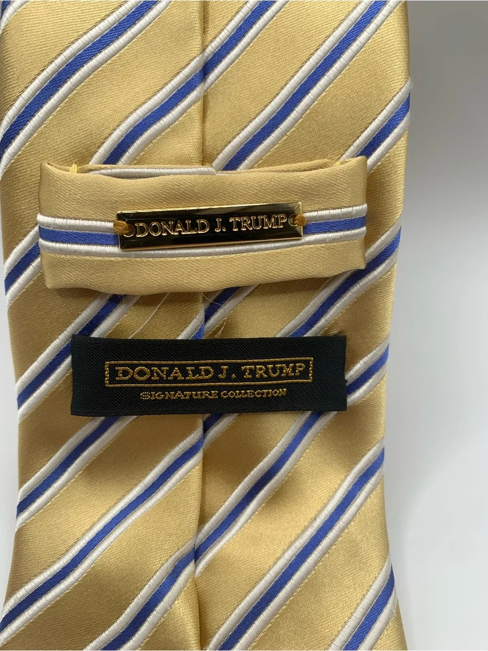 Donald J. Trump gold tie